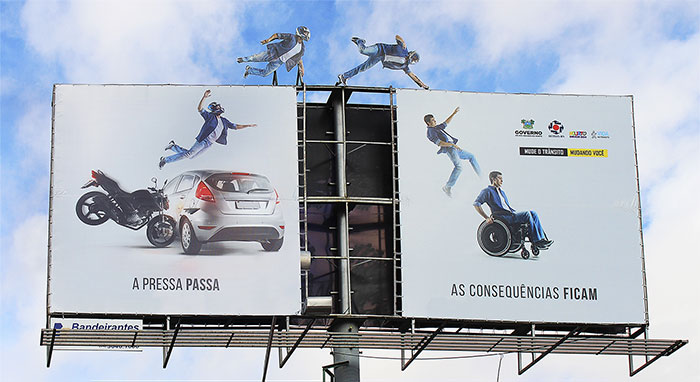 Print ad Anti-speeding motorbike to wheelchair across two billboards